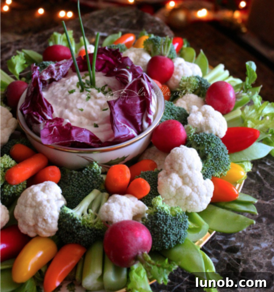 Winning Game Day Eats For Every Fan 8 A bowl of creamy vegetable and chip dip, perfect for a party snack.