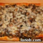 Mushroom, Fontina, and Asiago Puff Pastry Tart