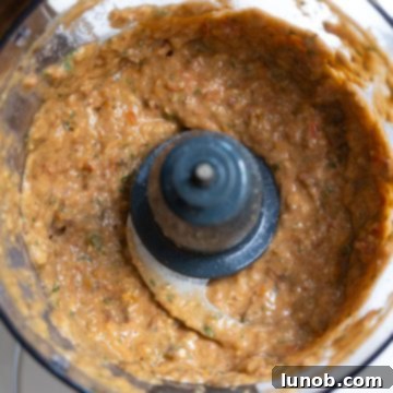 Sicilian Sun-Kissed Busiate 6 Pesto finished off with grated parmesan cheese.