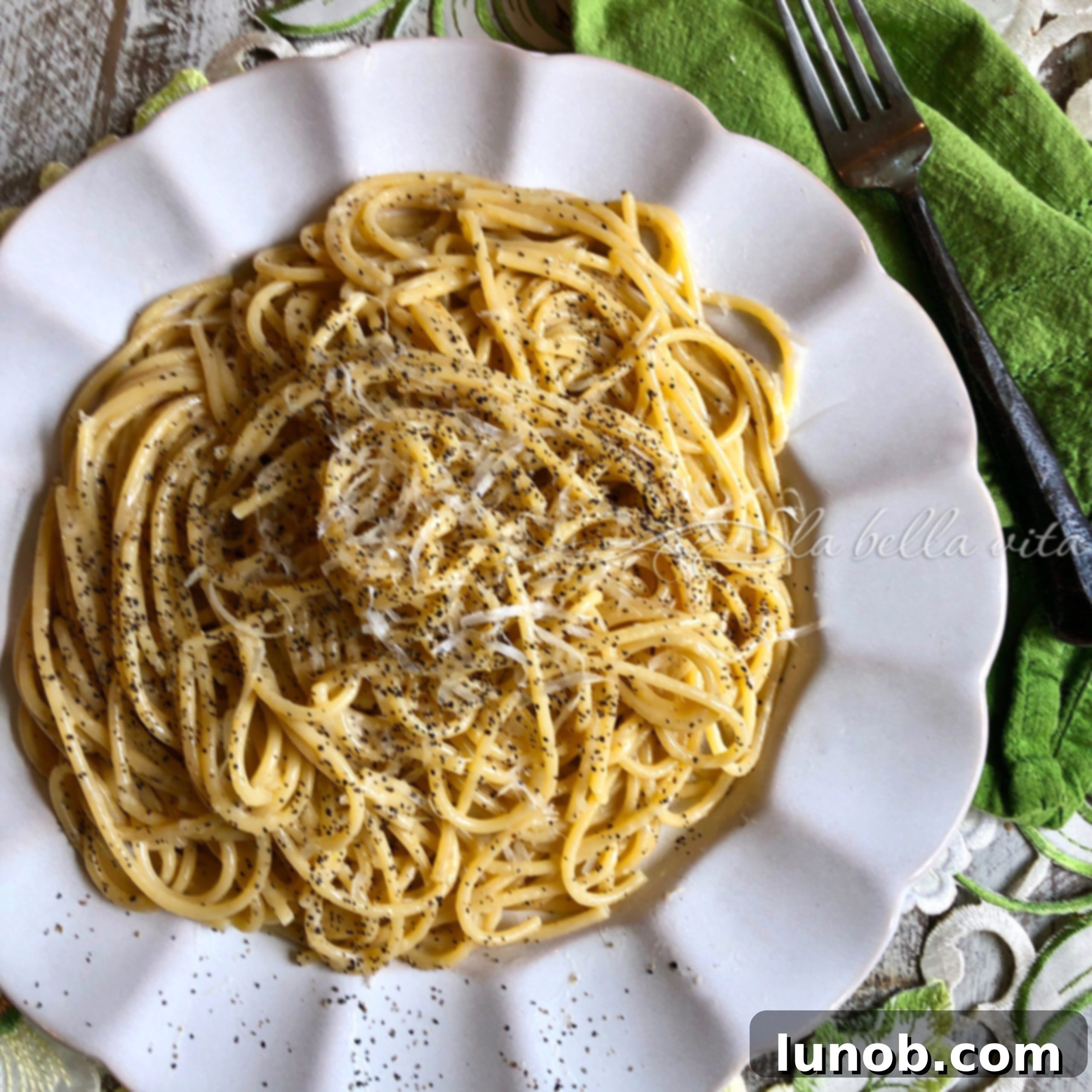 Cacio e Pepe: Rome's Iconic Pasta Perfection 15 Close up of Cacio e Pepe pasta ready to be served.