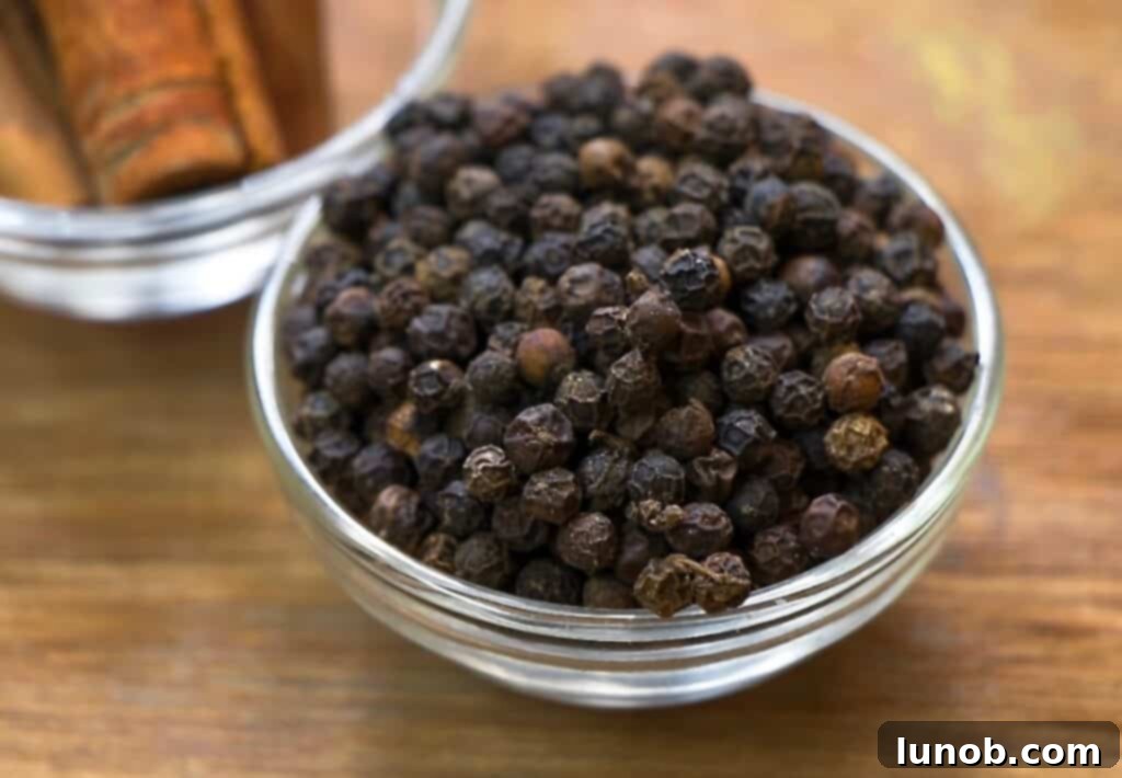 Cacio e Pepe: Rome's Iconic Pasta Perfection 3 Close-up of Cacio e Pepe pasta, showing the creamy texture and visible specks of black pepper.