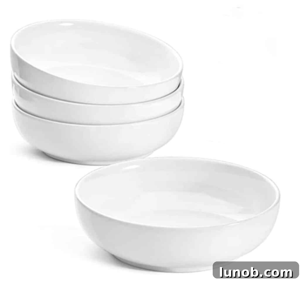 Cacio e Pepe: Rome's Iconic Pasta Perfection 9 Pasta bowls, wide and shallow, ideal for serving pasta.