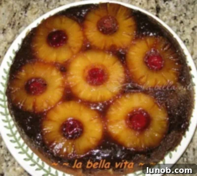 Pineapple Upside-Down Cake ready to be served, showing the rich caramel and fruit.