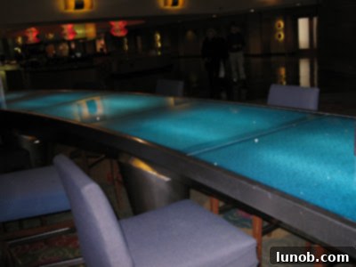 A turquoise stand-up bar lit-up from the inside, truly unique and modern for the city