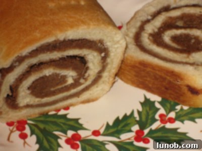 Traditional Povitisa Cinnamon Nut Bread, a sweet yeast bread with a rich walnut filling, perfect for holidays.