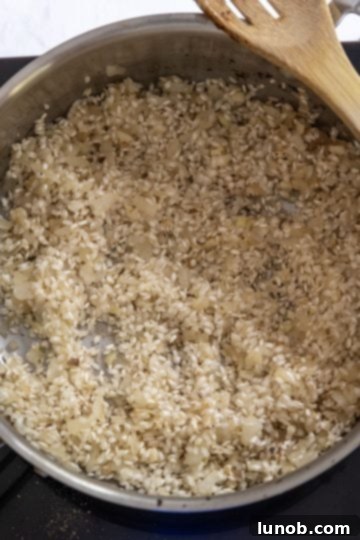 Velvet Truffle Mushroom Risotto 9 adding white wine to toasted arborio rice