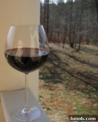 Pot roast simmering gently under a lid, filling the kitchen with its comforting aroma.