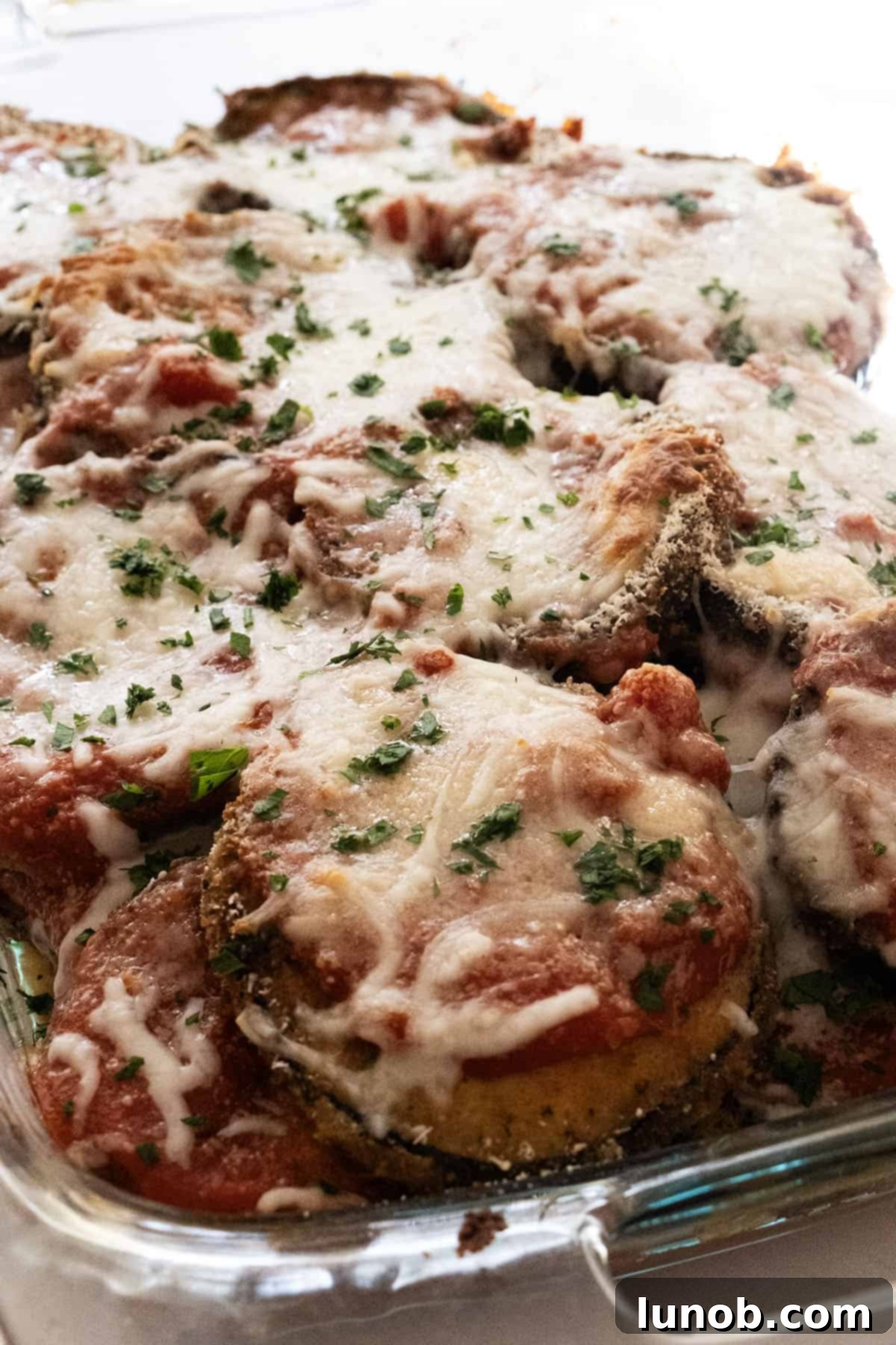 Our Eggplant Parmigiana Superior To Olive Garden 11 eggplant parmesan close up of melted mozzarella