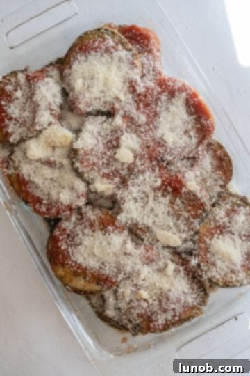 Our Eggplant Parmigiana Superior To Olive Garden 9 layering with parmesan cheese