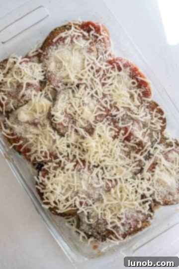 Our Eggplant Parmigiana Superior To Olive Garden 10 topped with mozzarella pre cooking