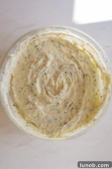 Creamy ricotta mixture for stuffing the shells, in a large bowl.