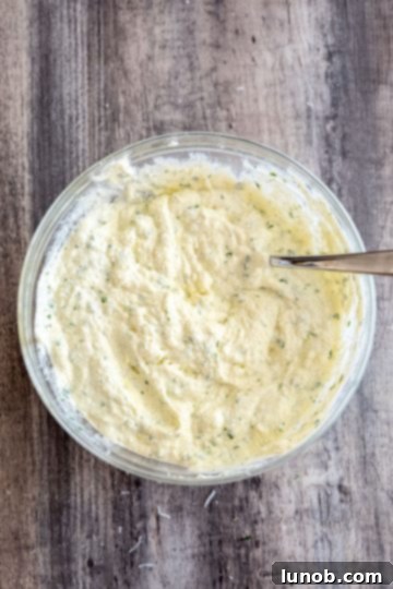 Creamy ricotta mixture with egg, parmesan, mozzarella, parsley, garlic, salt and pepper
