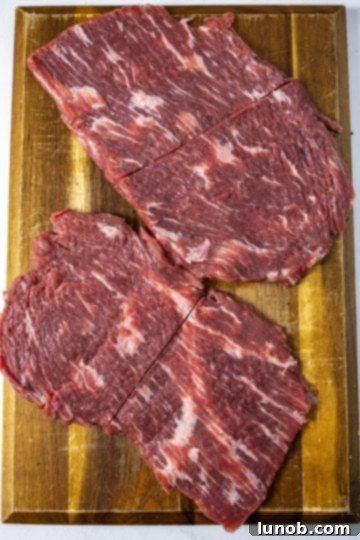 Flank steaks thinly sliced and tenderized