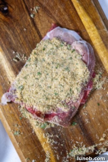 Braciole filling added to flank steak over prosciutto