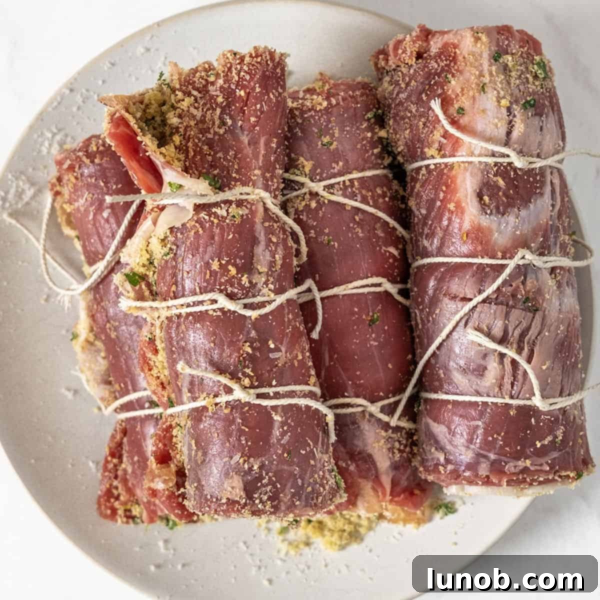 Bracioles tied off with butcher string