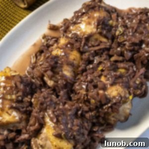 Braised Chicken Thighs with Red Wine and Fennel 10 Chicken thighs covered in red wine and fennel sauce