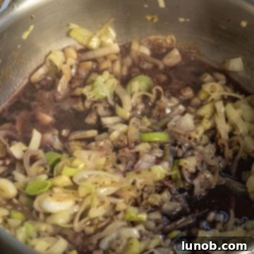 Braised Chicken Thighs with Red Wine and Fennel 6 reducing red wine