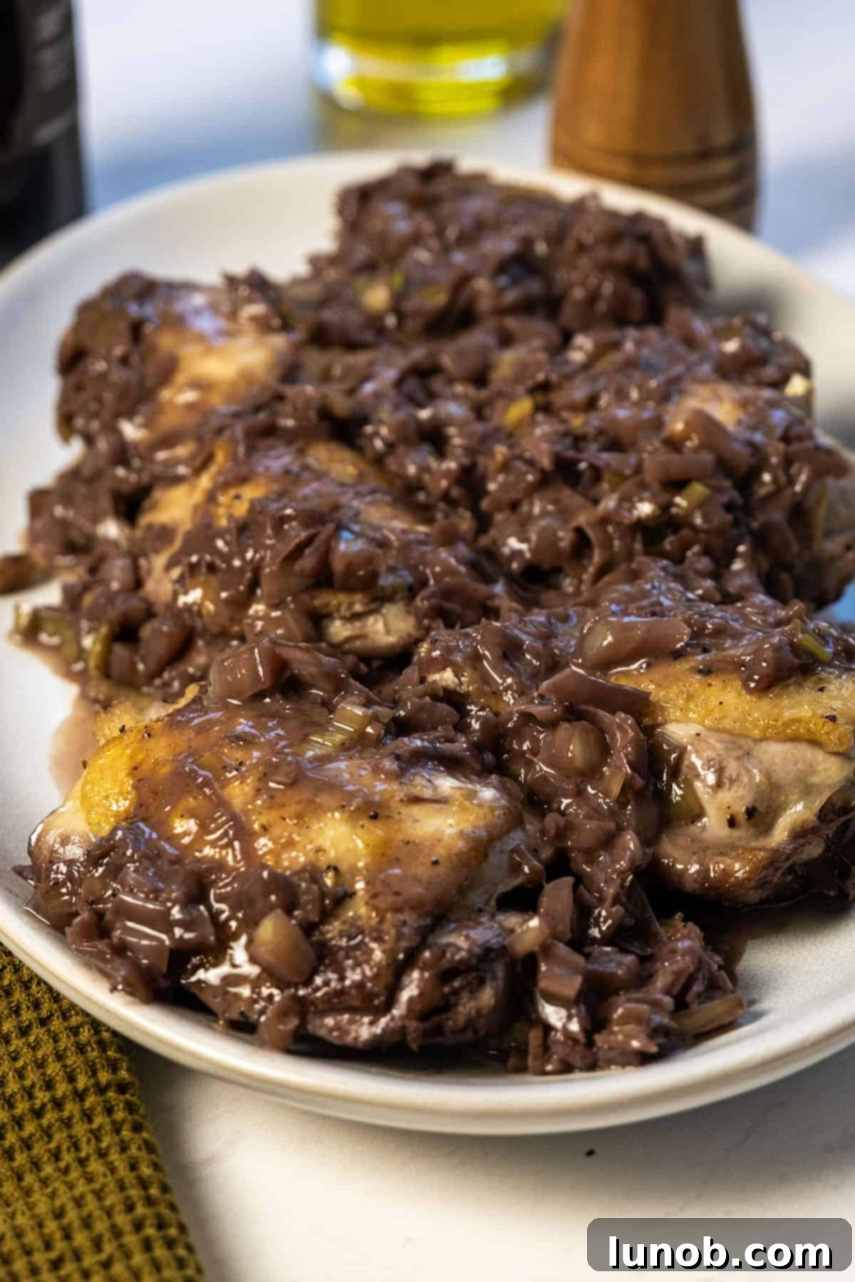 Braised Chicken Thighs with Red Wine and Fennel 9 Chicken thighs covered in red wine and fennel sauce