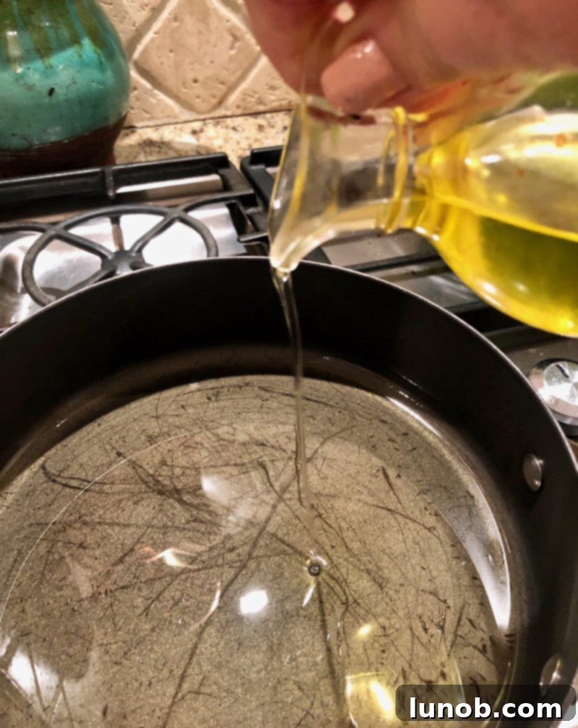 Master the Art of Pan-Seared Steak 5 Raw steak generously seasoned with salt and pepper