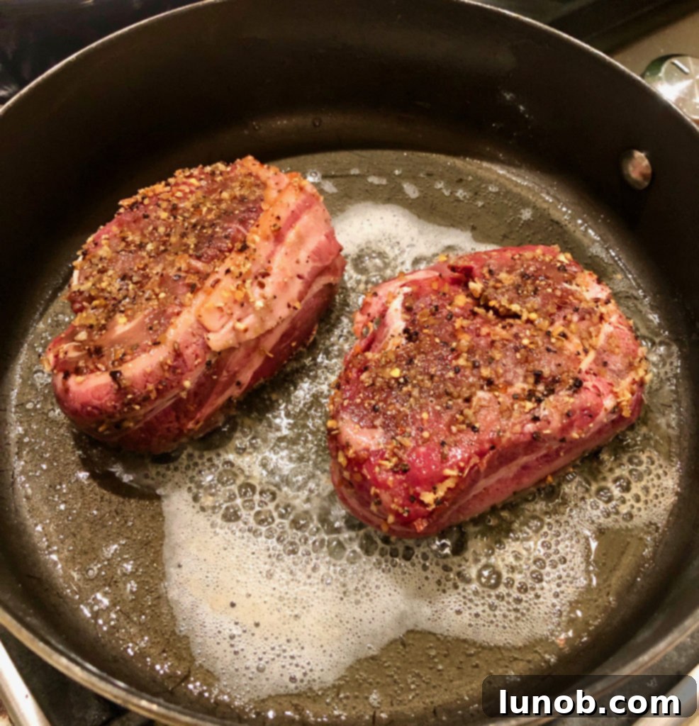 Master the Art of Pan-Seared Steak 6 Hot cast iron skillet with oil and butter shimmering