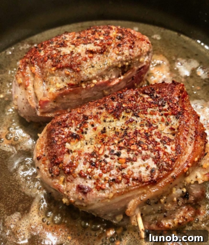 Master the Art of Pan-Seared Steak 7 Steak searing in a hot pan, developing a brown crust