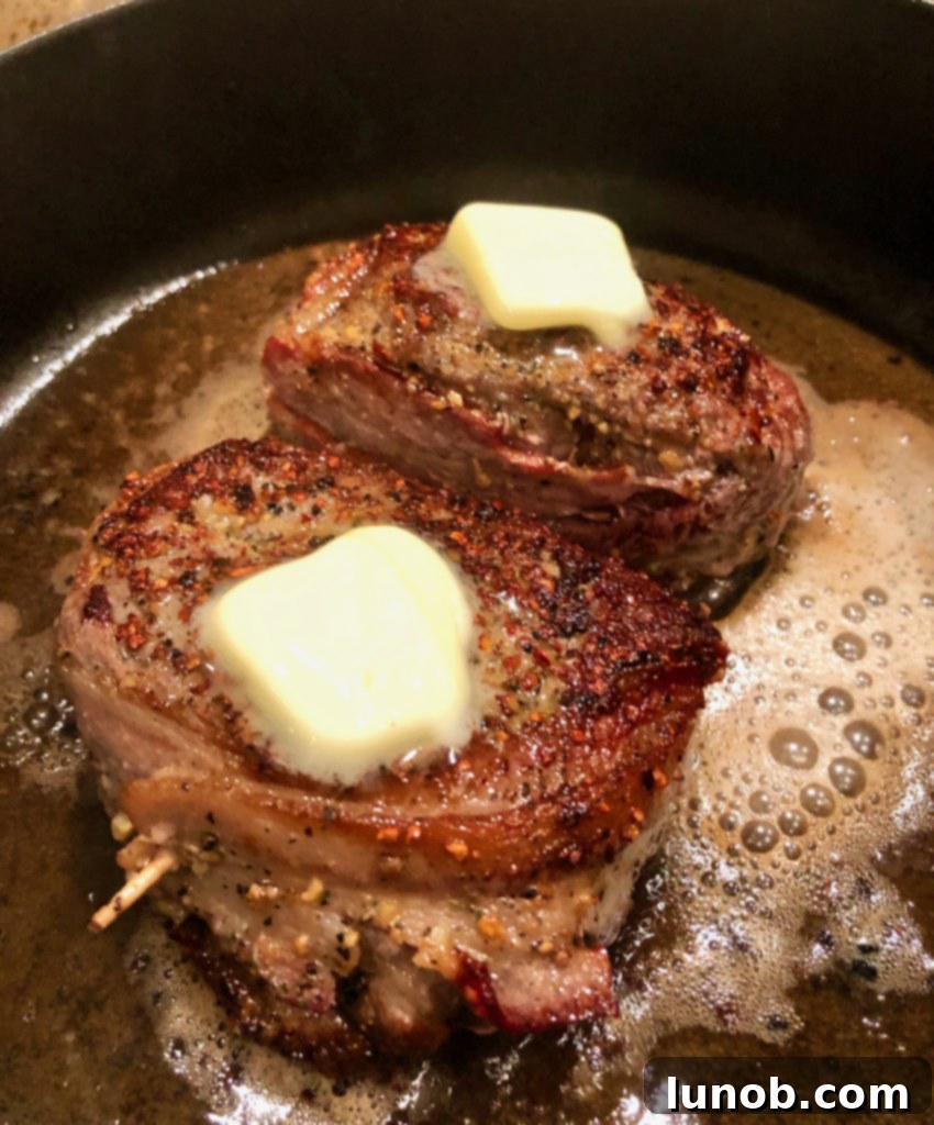 Master the Art of Pan-Seared Steak 8 Steak flipped over and searing on the second side in a hot pan