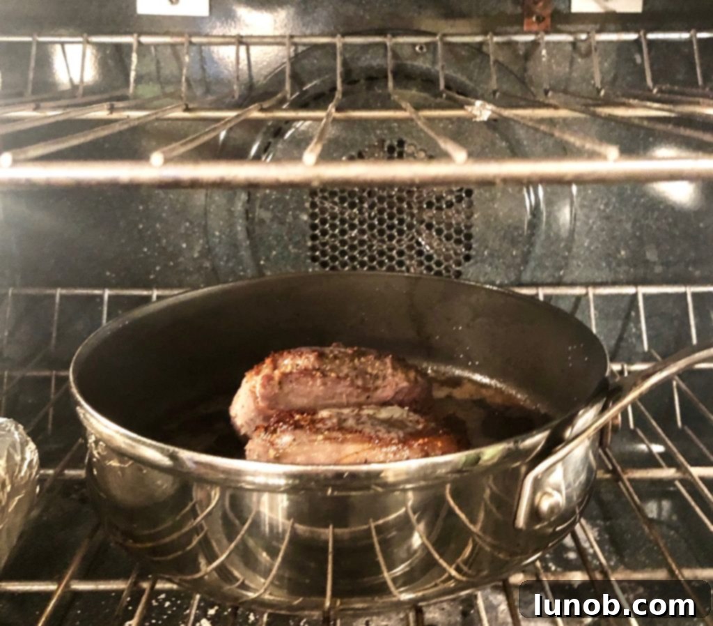 Master the Art of Pan-Seared Steak 10 Pan-seared steaks in cast iron skillet ready to go into the oven