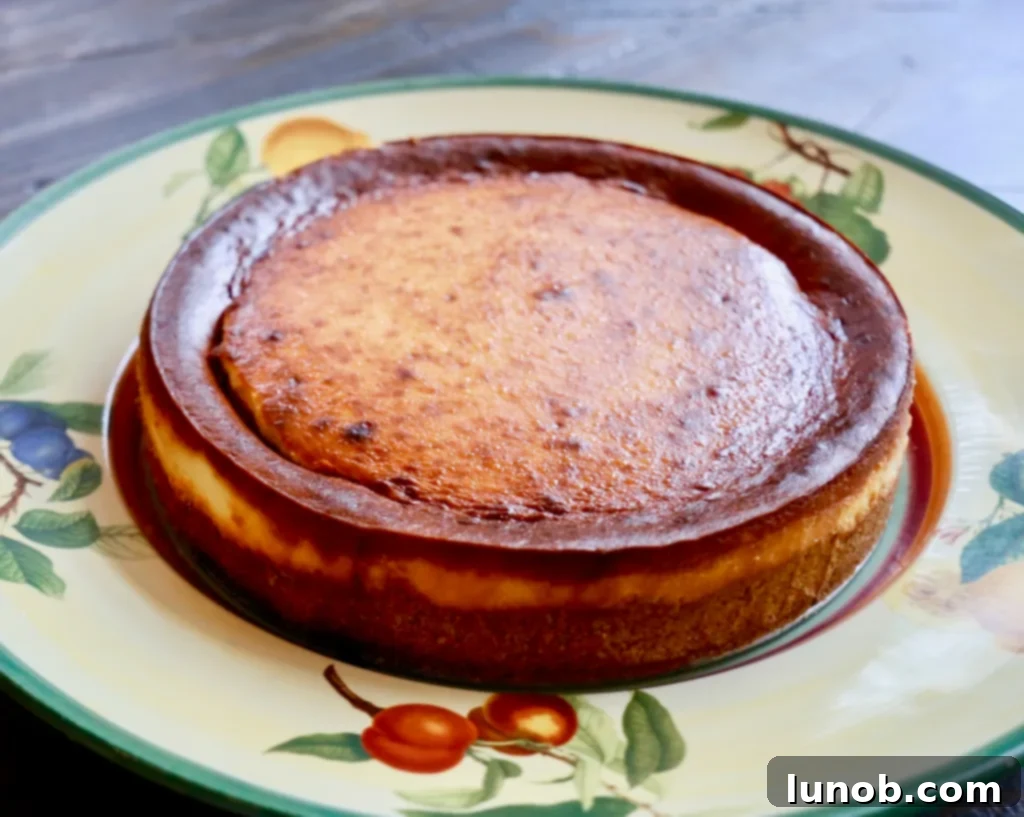 Cheesecake Perfection 19 The fully baked cheesecake cooling on a wire rack.