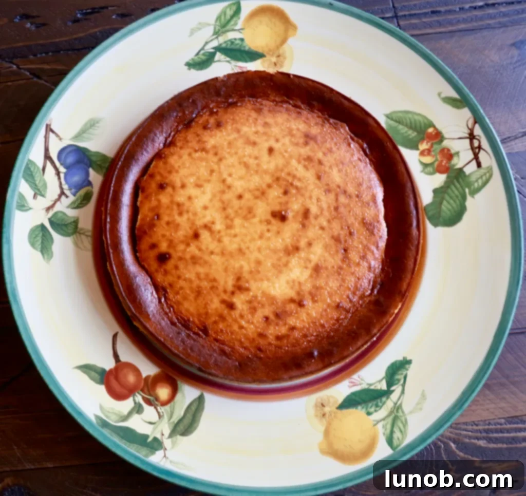 Cheesecake Perfection 20 Running a knife around the edge of a chilled cheesecake in a springform pan.