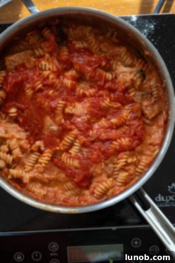 Velvety Chicken Parmesan Pasta 7 pasta added to sauce