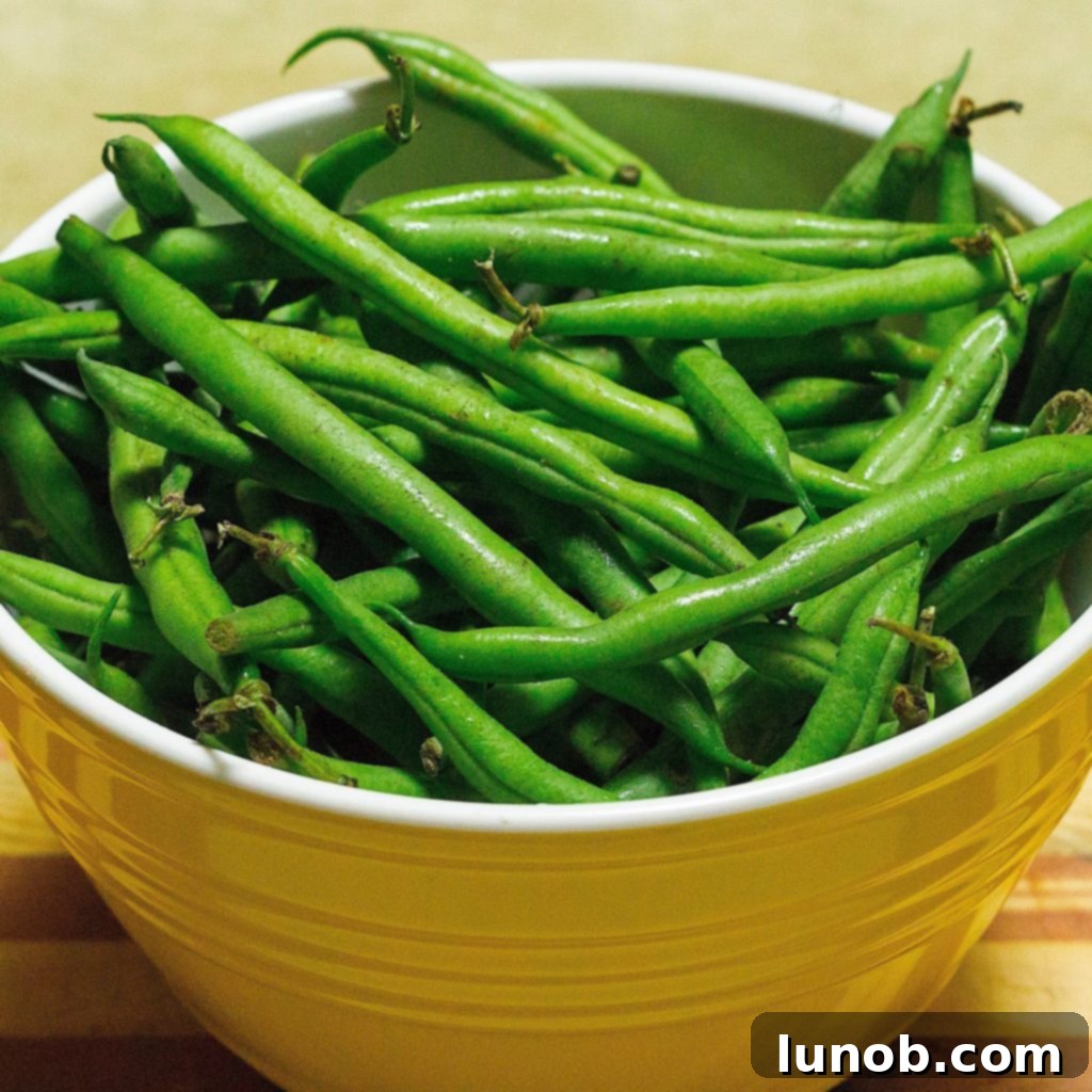 Kids trimming green beans on a porch