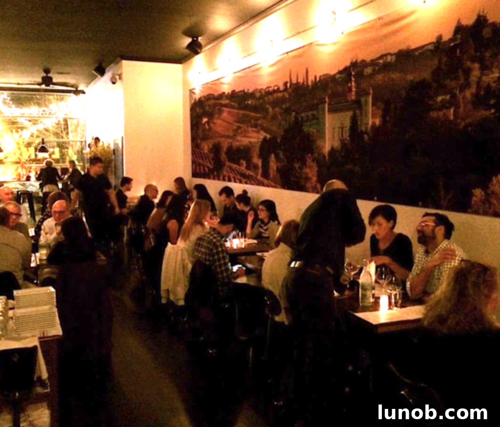 The appetizer section of Osteria Langhe's menu, elegantly designed, showcasing a curated selection of Piedmontese starters and traditional Italian delights.