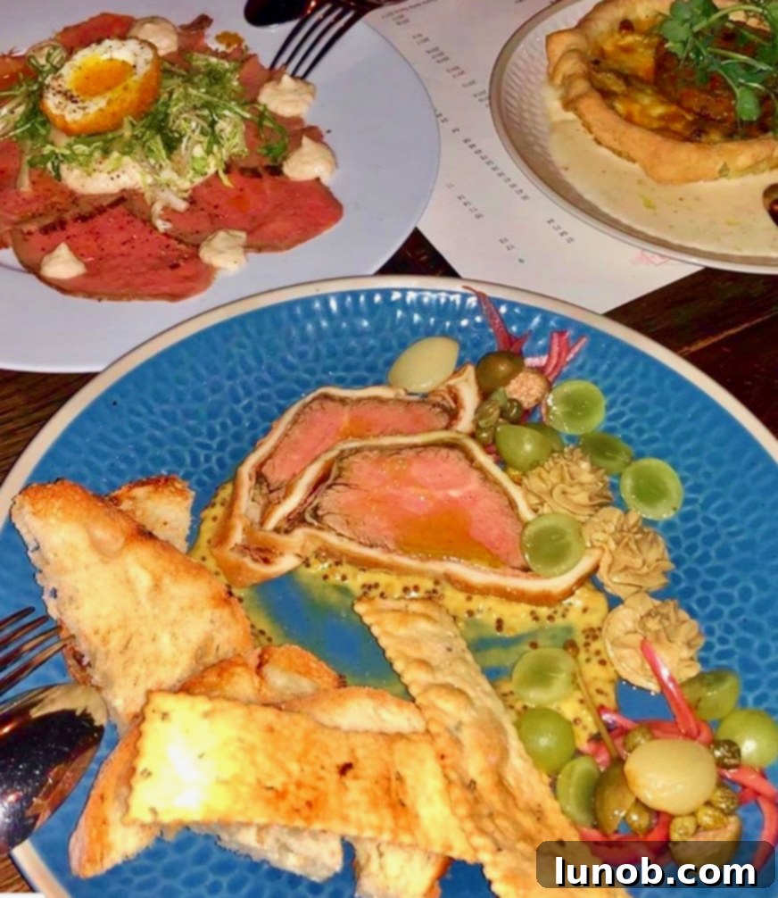 A beautifully plated risotto dish, showcasing its creamy texture, rich white truffle sauce, and a glistening dollop of rosemary and garlic lardo on top, inviting a luxurious taste.