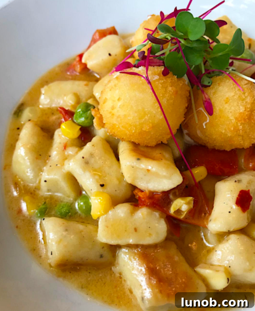 A close-up of a beautifully plated Limoncello Panna Cotta, showcasing its creamy texture, vibrant yellow hue, and elegant garnishes, promising a refreshing and sweet conclusion to the meal.