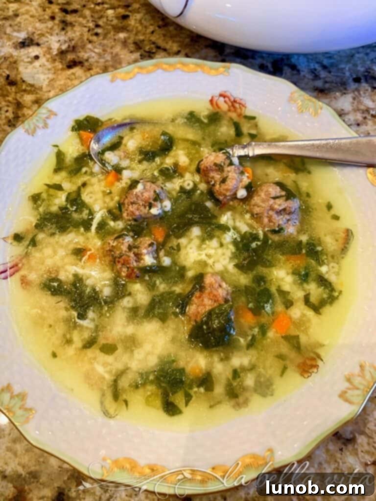 A bowl of Authentic Instant Pot Italian Wedding Soup, beautifully garnished and ready to be savored, perfect for a cozy meal.