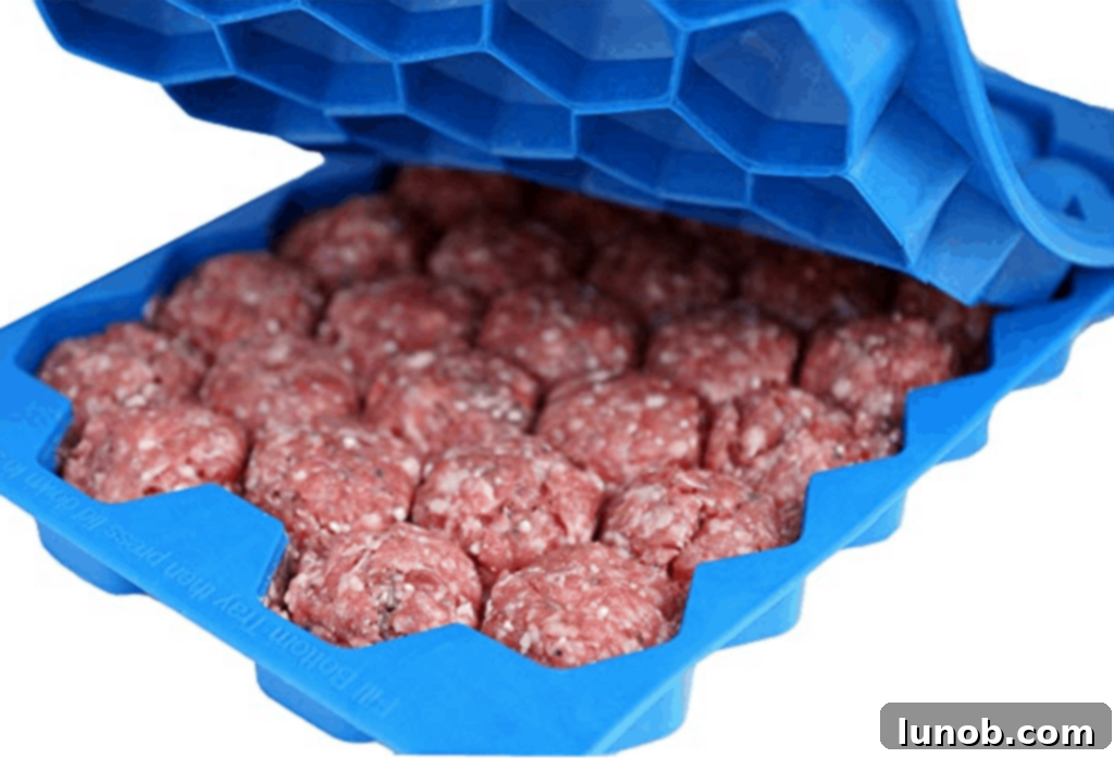 Master Meatball Maker tool for quickly creating dozens of meatballs, ideal for batch cooking and freezing.