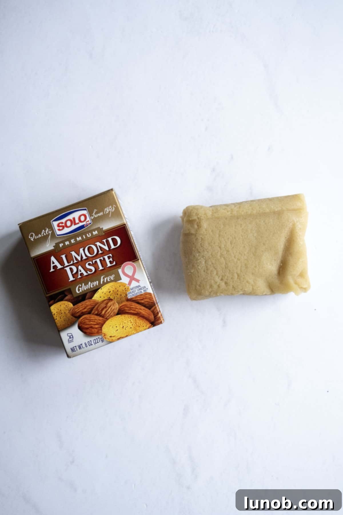 A block of Solo almond paste, a key ingredient for authentic flavor