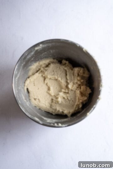 Creamed almond paste, butter, and sugar in a mixer