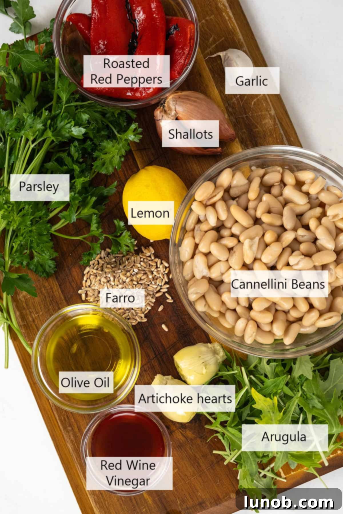 Mediterranean Farro White Bean Salad 3 Fresh ingredients for a vibrant farro salad, including cannellini beans, shallots, garlic, and parsley.