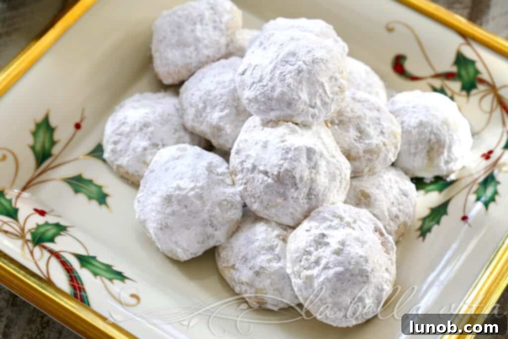 Decadent Nutella Surprise Snowballs 4 A charming basket filled with freshly baked Nutella Stuffed Snowball Cookies, ready to be enjoyed