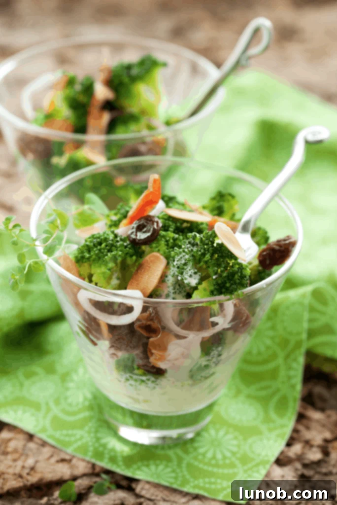 Classic, Creamy, Loaded Broccoli Salad with Bacon, Cheddar, and Cranberries