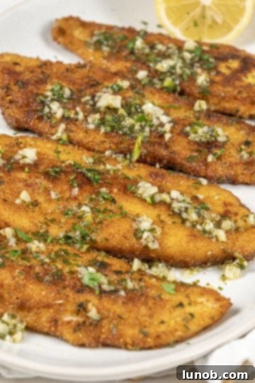 Crispy fried flounder oreganata, golden brown and seasoned perfectly.