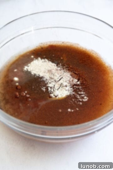 Smoky Chipotle BBQ Sauce 4 Ingredients combined for bbq sauce in a bowl