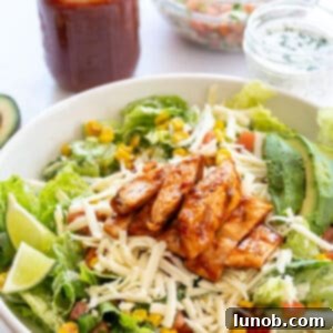 Zesty Chipotle BBQ Chicken Salad 9 Close-up of a serving of Chipotle BBQ Chicken Salad with cilantro lime ranch dressing, ready to eat.