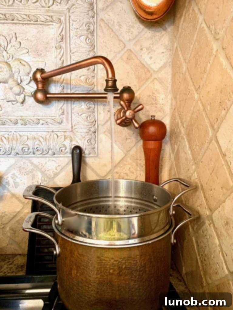 Turkey Tetrazzini: Cheesy Italian Delight with Crispy Garlic Butter Topping 6 Boiling water in a tall pot for cooking pasta