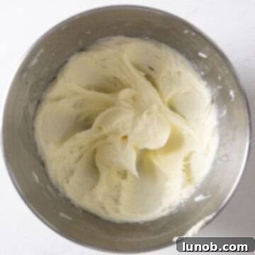 Creamy frosting mixed together in a bowl, ready for application.