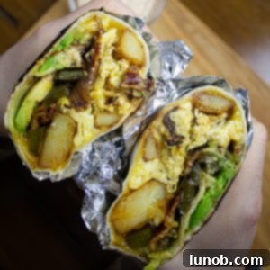 Zesty Southwest Potato Breakfast Burrito 5 A delicious and hearty Southwest breakfast burrito, featuring a golden-brown tortilla and savory fillings.