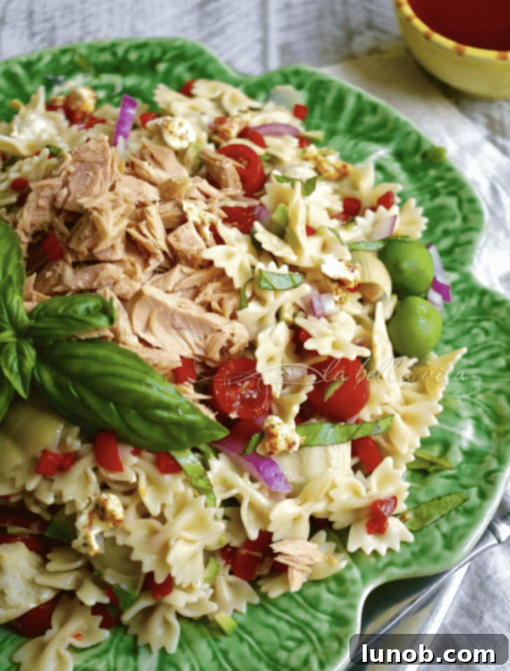 Italian Easter & Spring Feasts: 49 Delicious Recipes 23 Refreshing Tuna and Artichoke Pasta Salad, ideal for al fresco dining