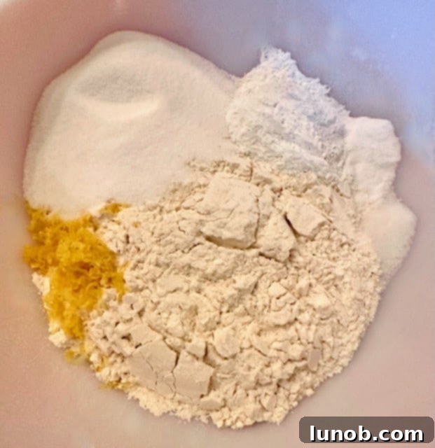 Dry ingredients for scones mixed in a large bowl.