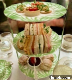 Close-up of the bottom tier of an afternoon tea tray, displaying freshly baked scones.
